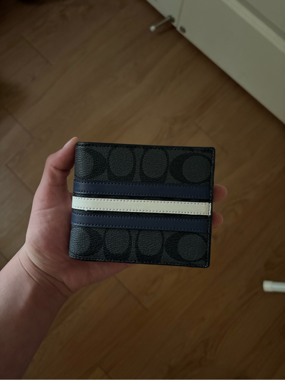 Coach Men's Black and Navy Signature Canvas Bifold Wallet with White Stripe